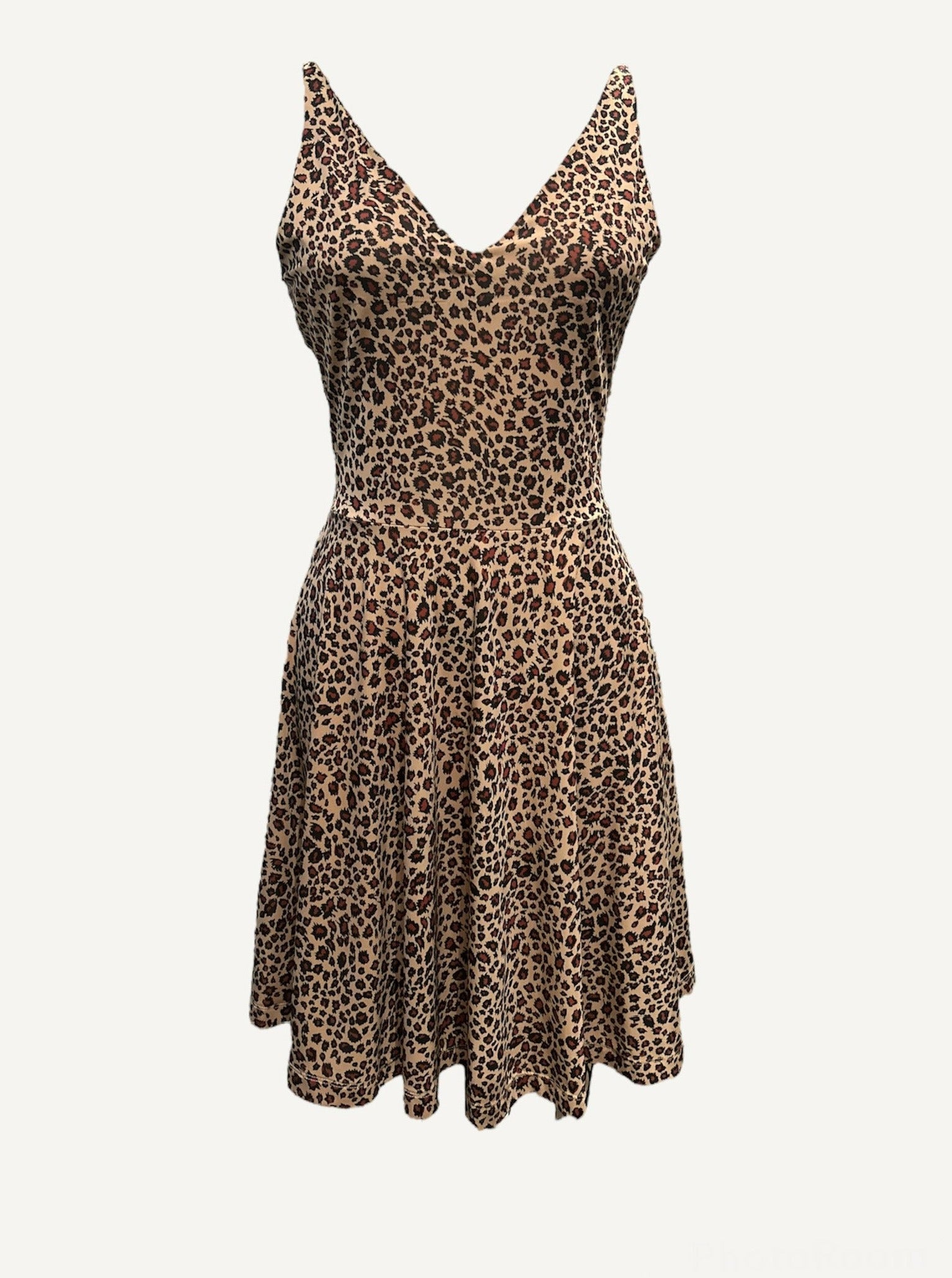a leopard animal print dress with a v-neck and no sleeves